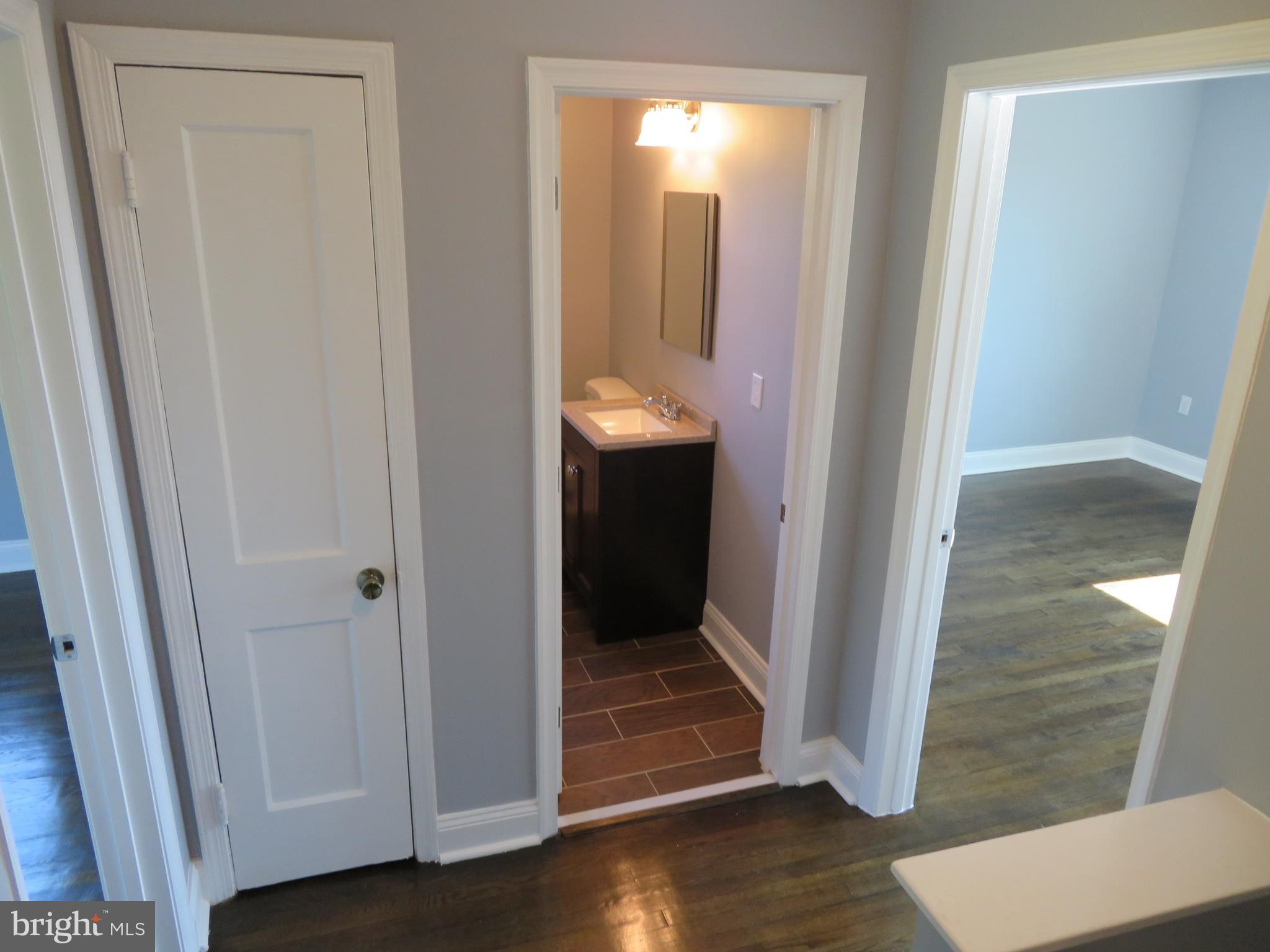 4005 Pimlico Road Baltimore, MD 21215 - Photo 23 of 45 2nd Level Hallway with Linen Closet, 2 Beds 1 Bath