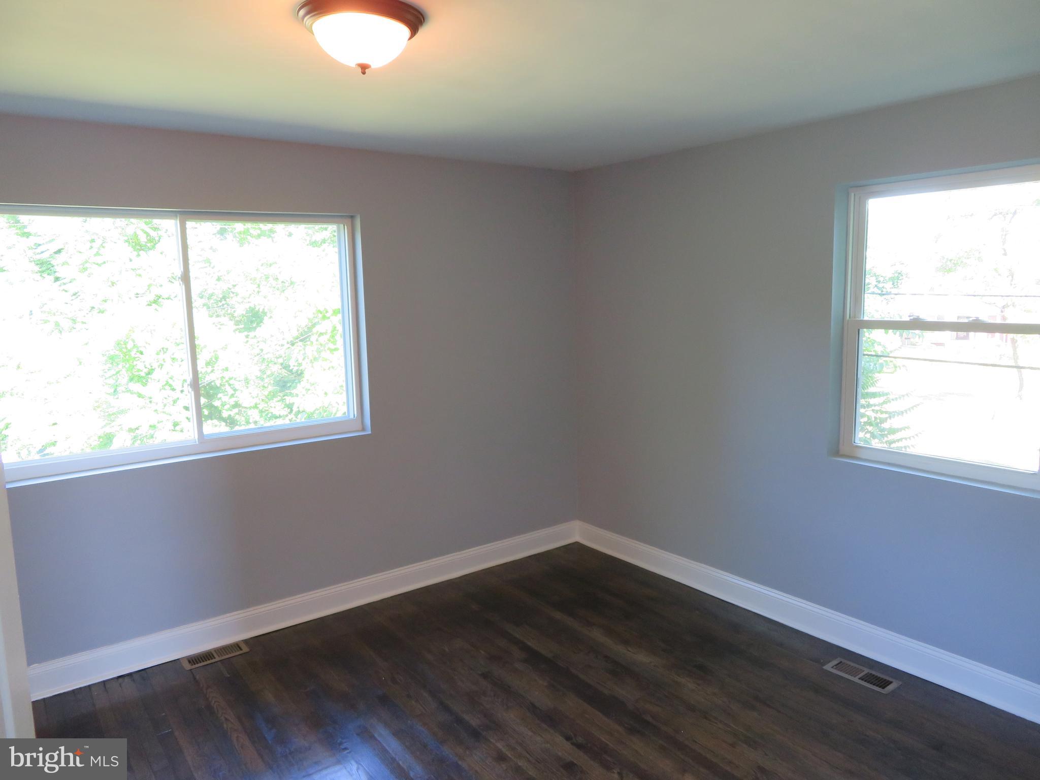 4005 Pimlico Road Baltimore, MD 21215 - Photo 25 of 45 2nd Level Bedroom 1 - Bright Windows and Hardwood
