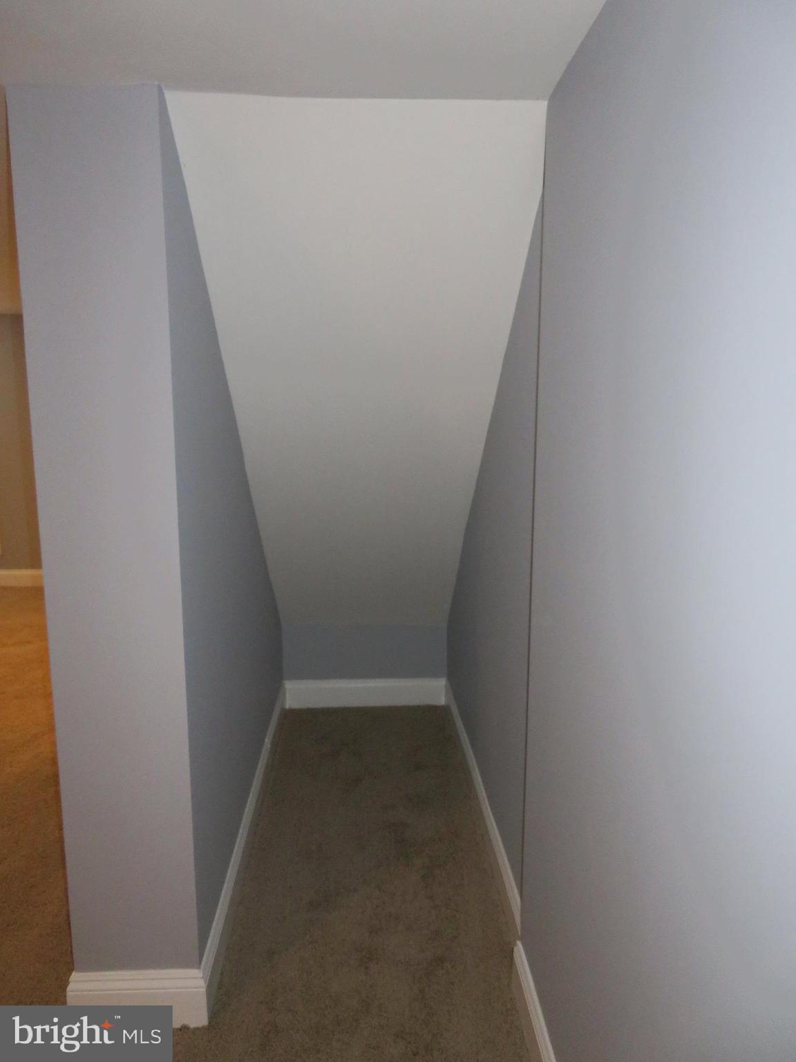 4005 Pimlico Road Baltimore, MD 21215 - Photo 35 of 45 Basement storage under stairs