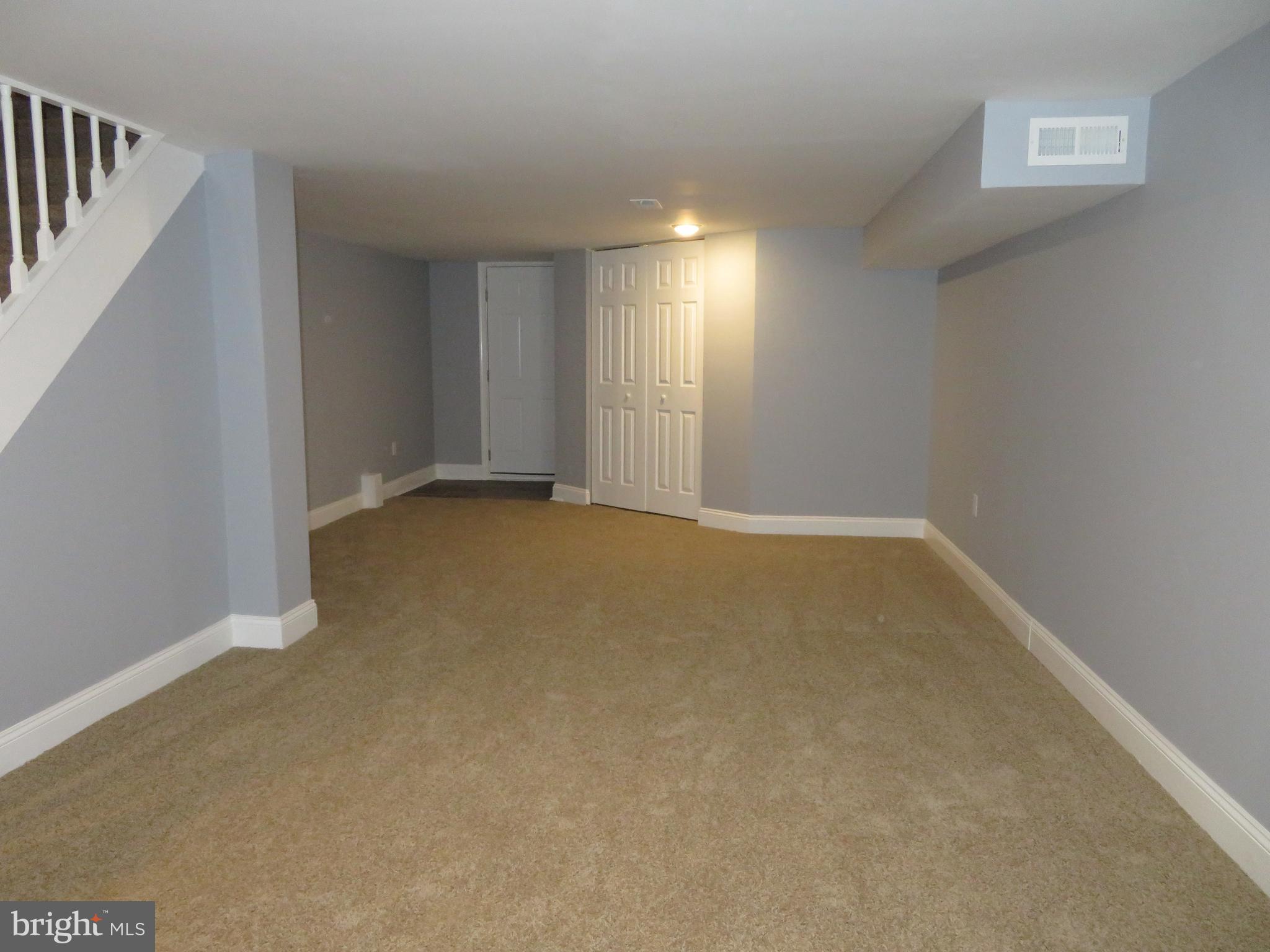 4005 Pimlico Road Baltimore, MD 21215 - Photo 36 of 45 Basement - view of utility room and rear walkout