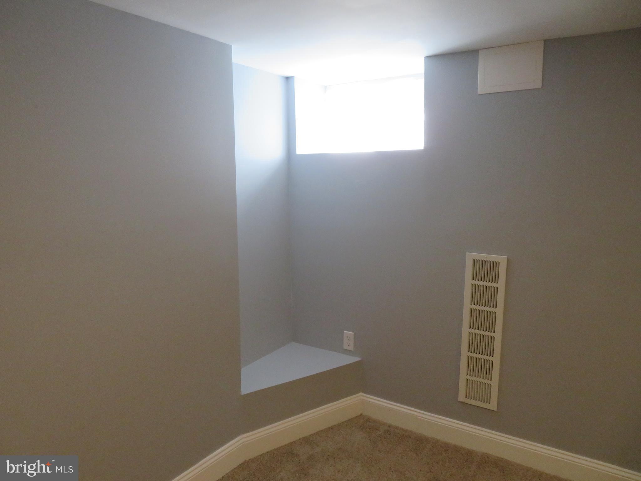 4005 Pimlico Road Baltimore, MD 21215 - Photo 37 of 45 Basement Alcove shelf and window