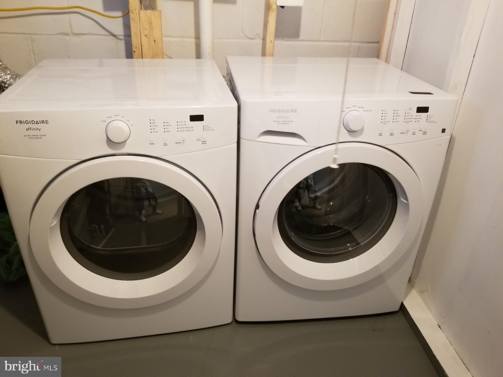 4005 Pimlico Road Baltimore, MD 21215 - Photo 39 of 45 Utility Room - Front Load Washer and Dryer