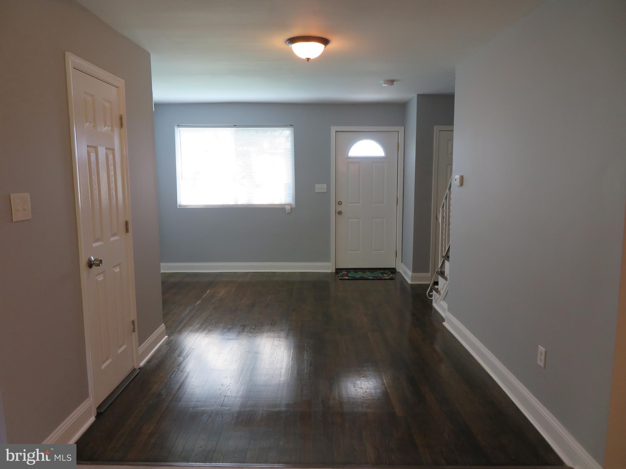 4005 Pimlico Road Baltimore, MD 21215 - Photo 6 of 45 Open Living Room, Front Door & Powder Room Access
