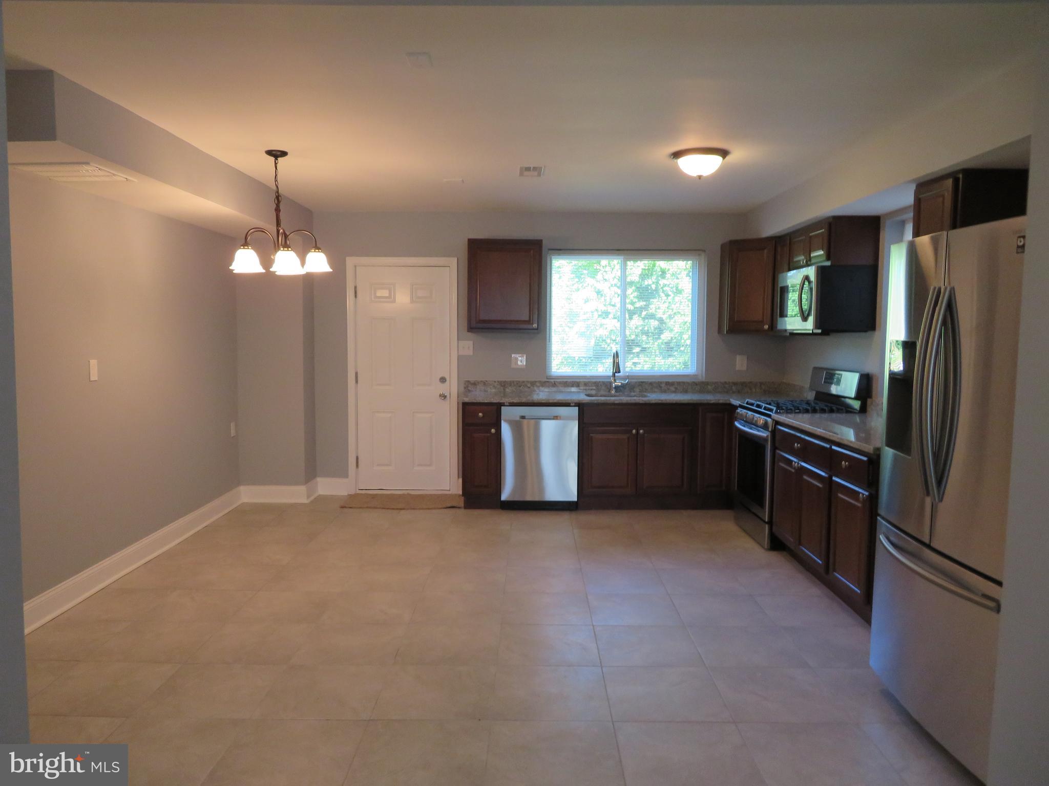 4005 Pimlico Road Baltimore, MD 21215 - Photo 9 of 45 Open Eat-In Kitchen and Dining Area