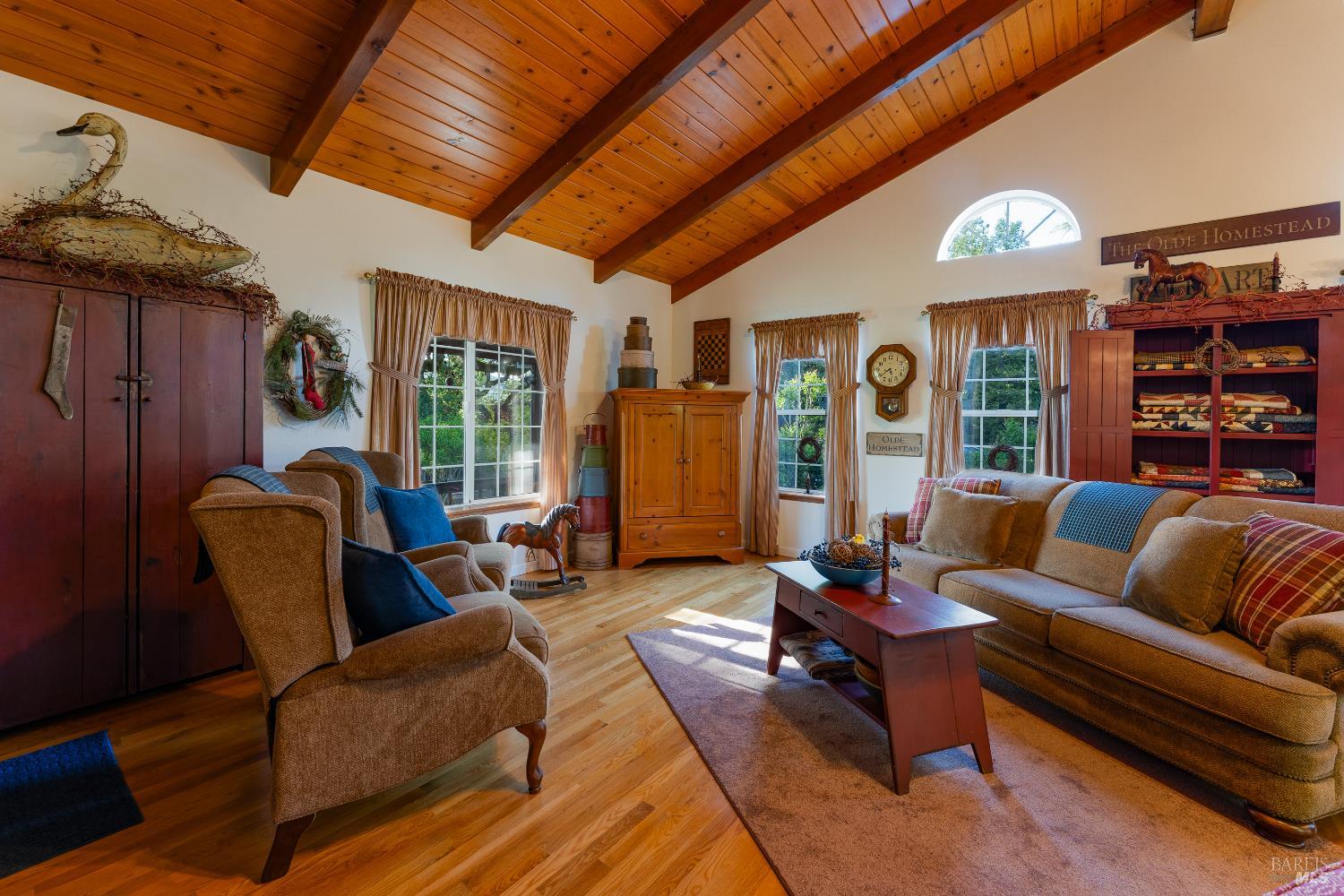 1991 Fern Canyon Road Ukiah, CA 95482 - Photo 13 of 19 a living room with furniture a ceiling fan and a window