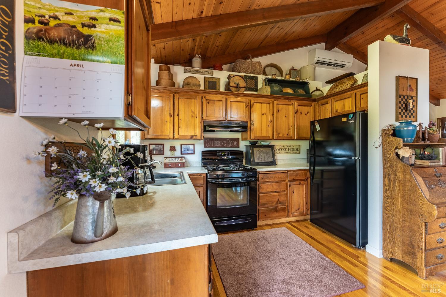 1991 Fern Canyon Road Ukiah, CA 95482 - Photo 15 of 19 a kitchen with a stove and a refrigerator