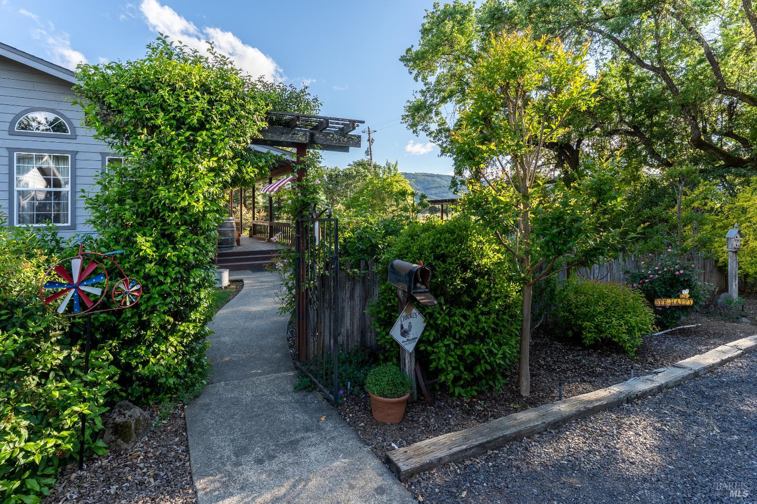 1991 Fern Canyon Road Ukiah, CA 95482 - Photo 9 of 19 a view of a garden with large trees