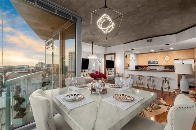 a view of a dining room with furniture window and outside view