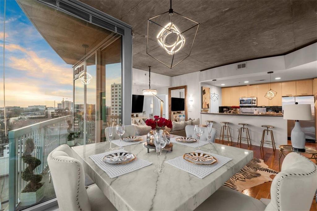 a view of a dining room with furniture window and outside view