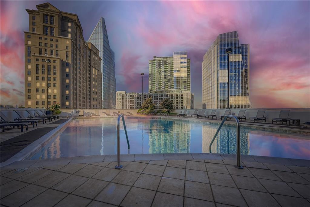 3324 Peachtree Road Northeast, Unit 902 Atlanta, GA 30326 - Photo 27 of 29 a kitchen with a large window and counter top space