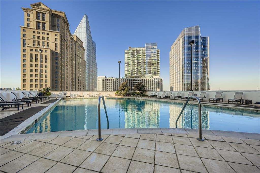 3324 Peachtree Road Northeast, Unit 902 Atlanta, GA 30326 - Photo 28 of 29 a kitchen with a stove a sink and a oven