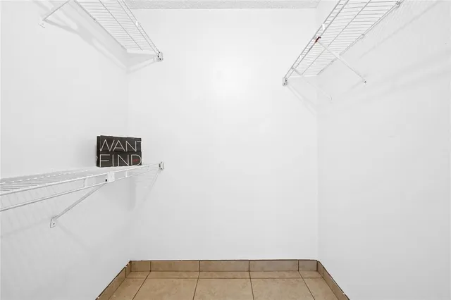 a view of a room with racks on the wall