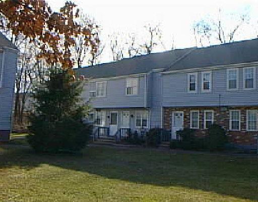 16 Scuppo Road, Unit F8 Danbury, CT 06811 - Photo 1 of 1 a house view with a garden space