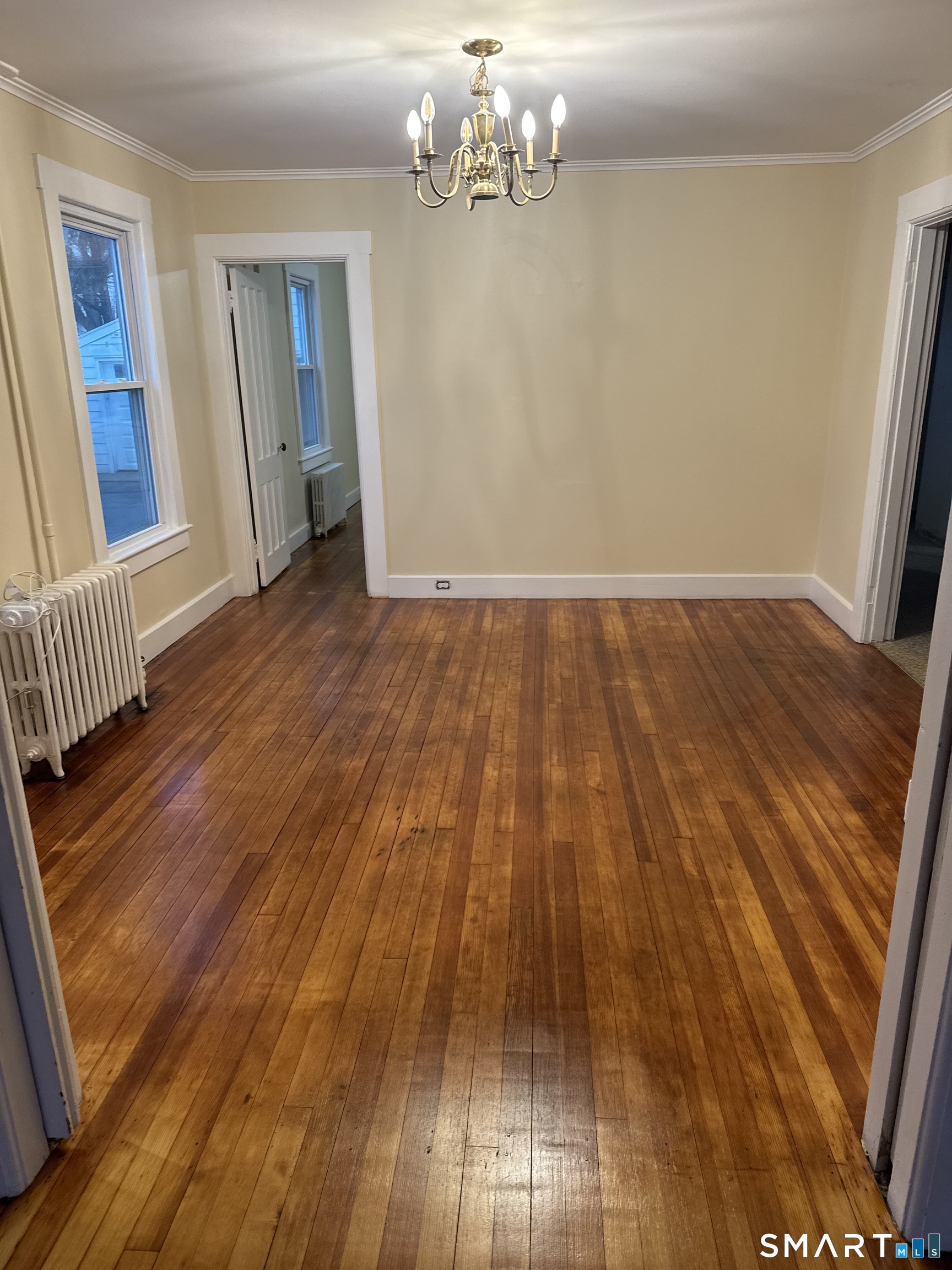 79 Meadow Street Seymour, CT 06483 - Photo 9 of 9 a view of empty room with wooden floor