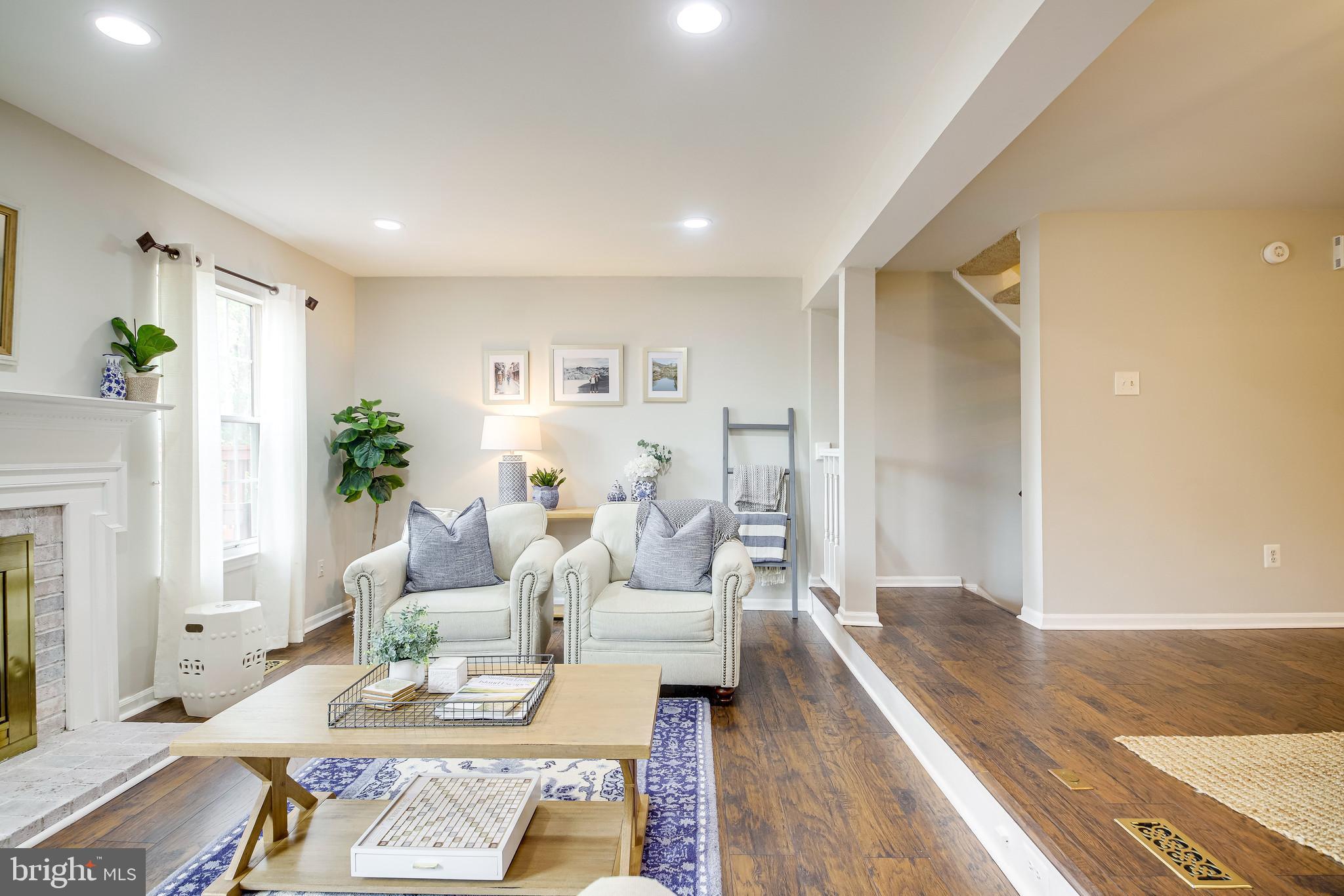 1490 Autumn Ridge Circle Reston, VA 20194 - Photo 17 of 60 Living Room opens to the Dining Room
