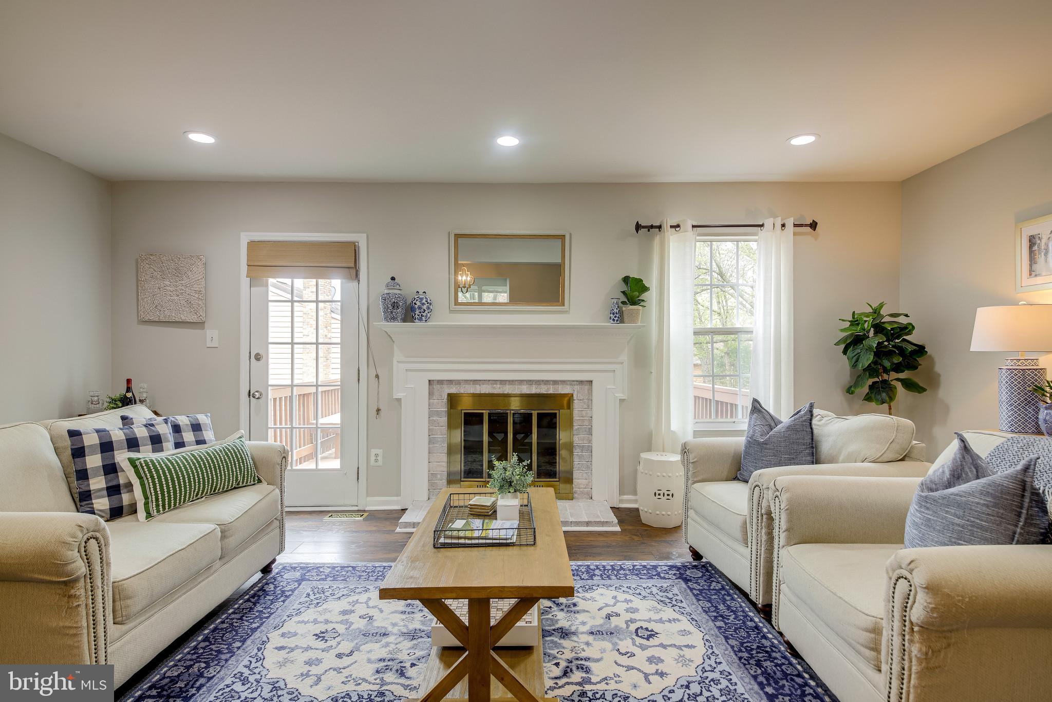 1490 Autumn Ridge Circle Reston, VA 20194 - Photo 19 of 60 Warm & inviting Liv room w/ wood-burning fireplace