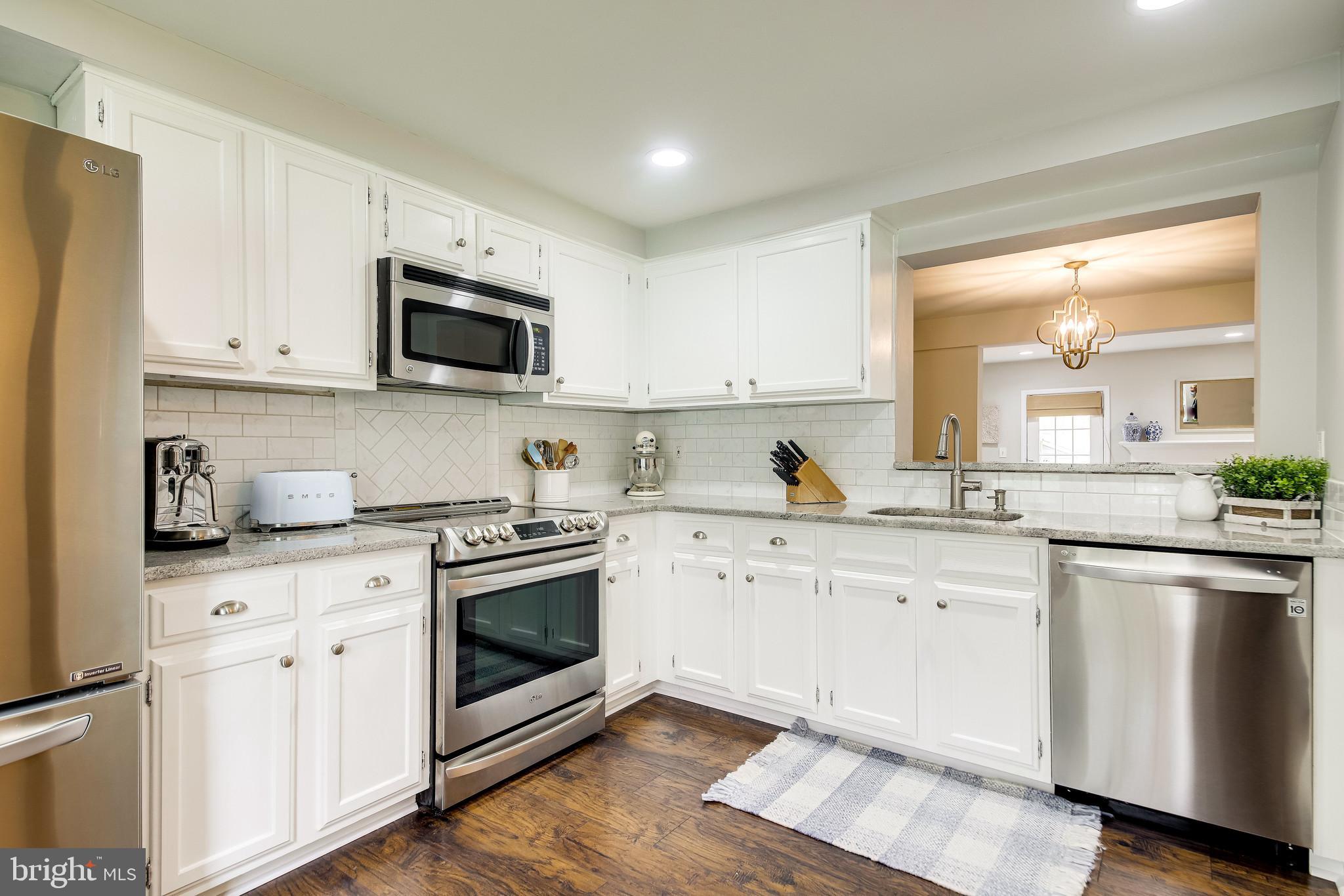 1490 Autumn Ridge Circle Reston, VA 20194 - Photo 3 of 60 Updated Kitchen - Tile Backsplash