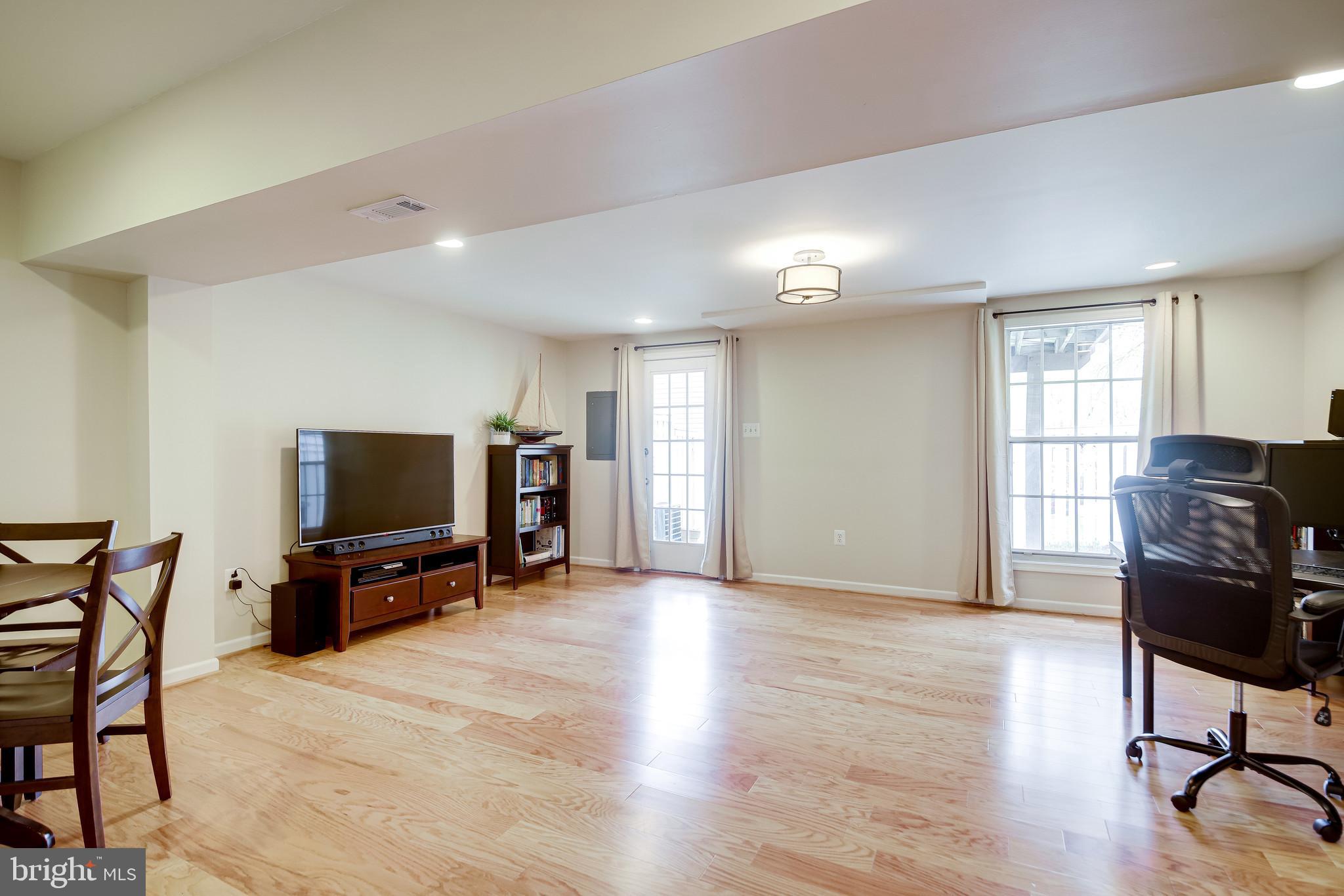 1490 Autumn Ridge Circle Reston, VA 20194 - Photo 38 of 60 Spacious Rec Room with walkout to the backyard