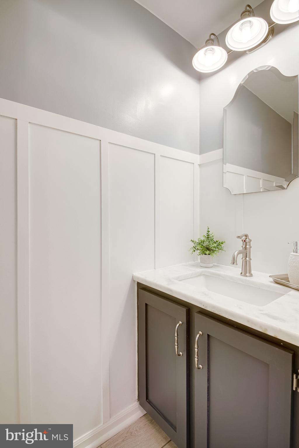 1490 Autumn Ridge Circle Reston, VA 20194 - Photo 8 of 60 Half Bath on Main level with Carerra marble top.