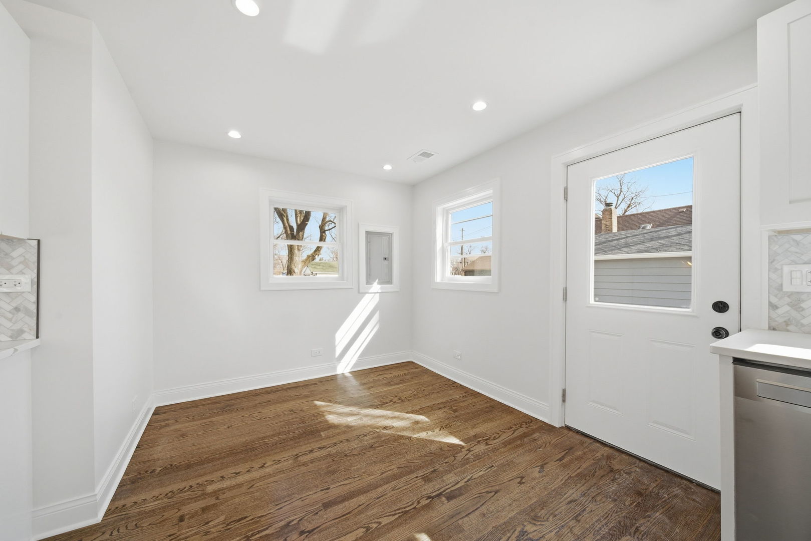 7851 Suburban Lane Bridgeview, IL 60455 - Photo 16 of 50 a view of empty room with wooden floor