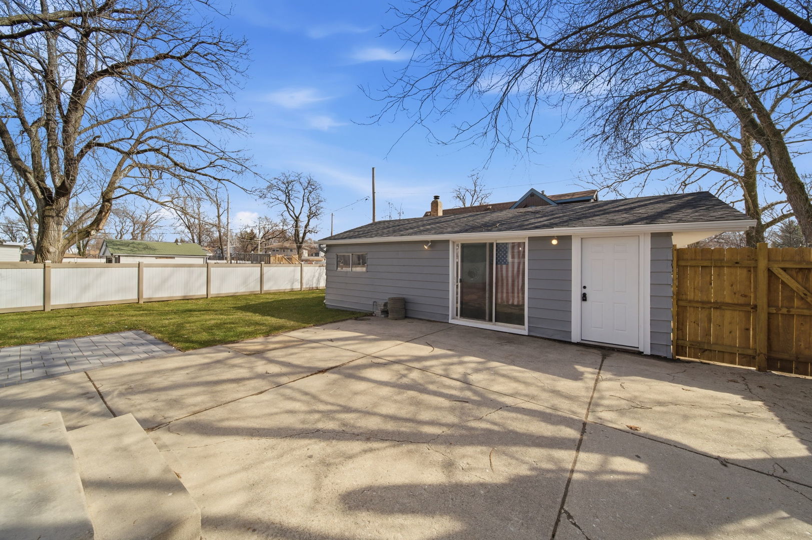 7851 Suburban Lane Bridgeview, IL 60455 - Photo 38 of 50 a view of a house with a yard