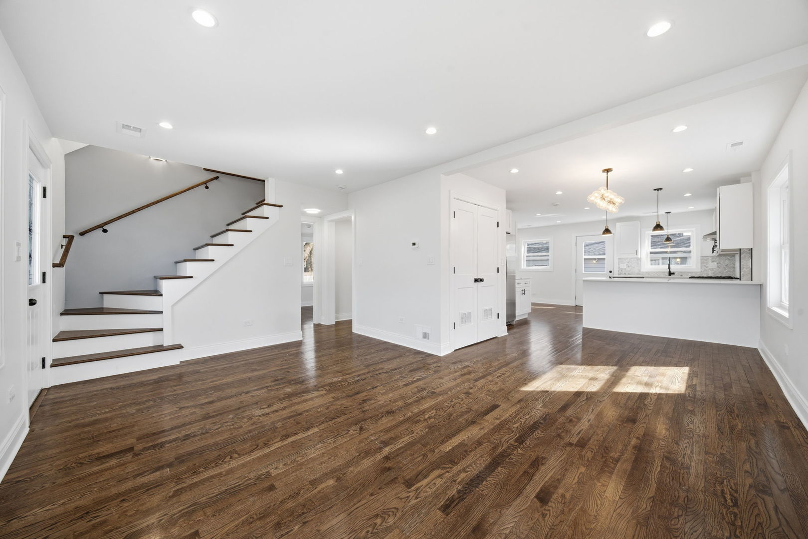 7851 Suburban Lane Bridgeview, IL 60455 - Photo 6 of 50 a view of kitchen and hall with wooden floor