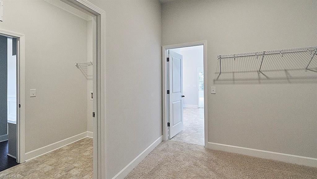 7159 Conrad Farm Road, Unit 188 Pfafftown, NC 27040 - Photo 13 of 26 Master Closet with door to laundry room