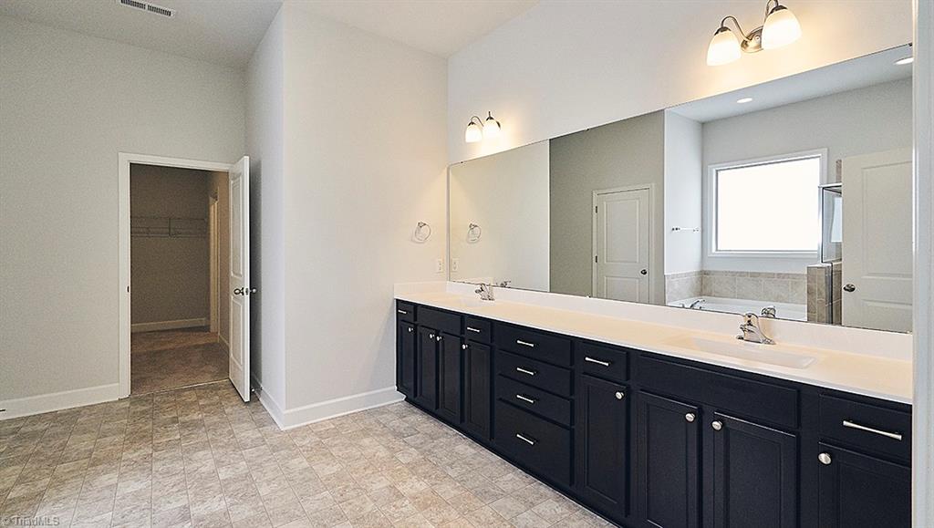 7159 Conrad Farm Road, Unit 188 Pfafftown, NC 27040 - Photo 16 of 26 Master Bath-similar to photo. Finishes are different