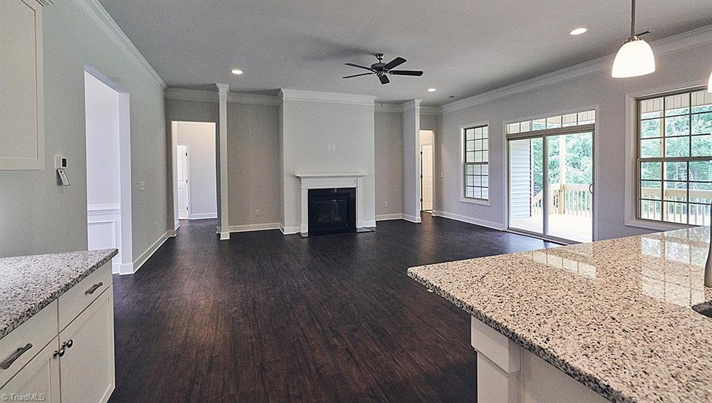 7159 Conrad Farm Road, Unit 188 Pfafftown, NC 27040 - Photo 20 of 26 Kitchen to Great Room. Door to covered porch at rear