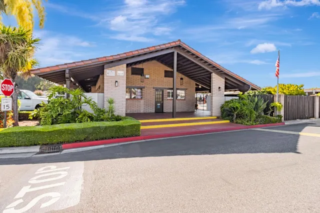 a view of front of house with a yard