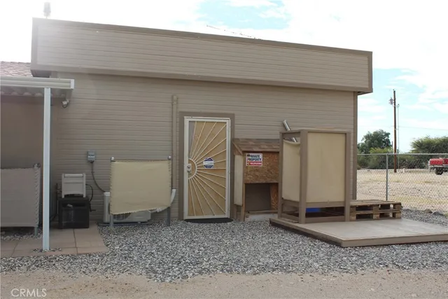 a kitchen with a refrigerator a sink and cabinets