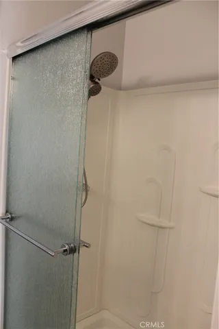 a kitchen with stainless steel appliances granite countertop a stove and a microwave