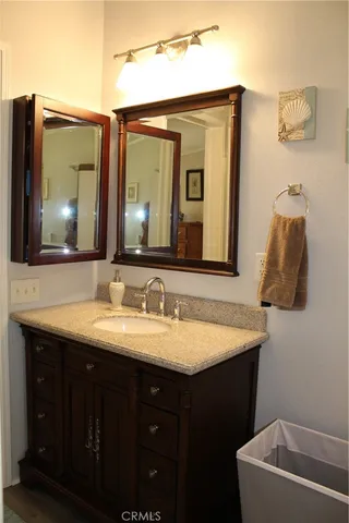 a view of a dining room with furniture and a window