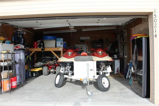 a view of a backyard and water fountain