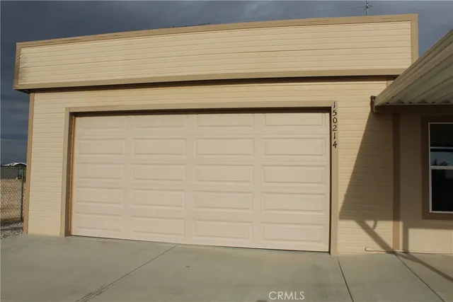 a view of balcony with floor to ceiling window