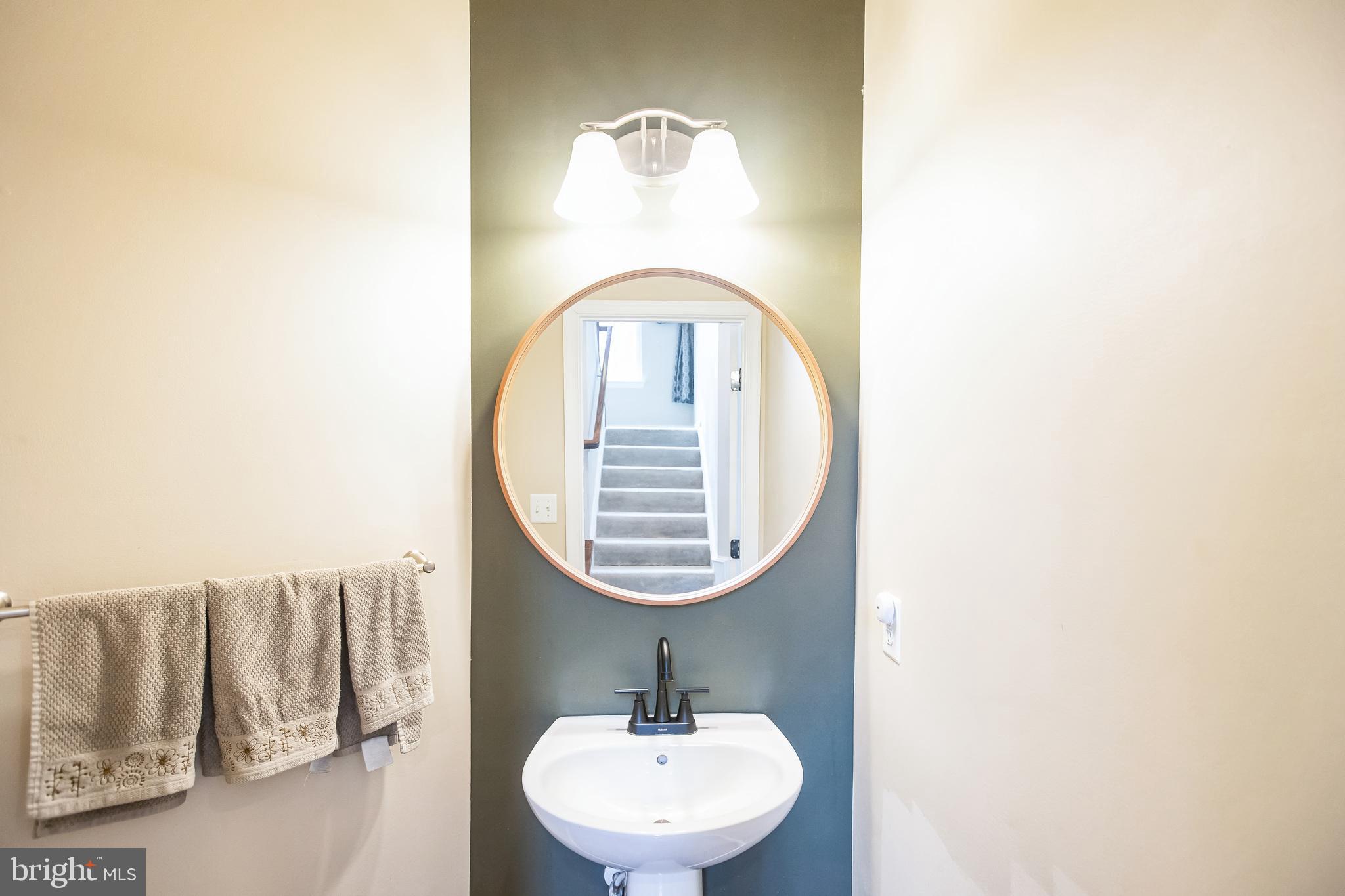 2601 St Marys View Road Accokeek, MD 20607 - Photo 12 of 33 a bathroom with a sink and a mirror