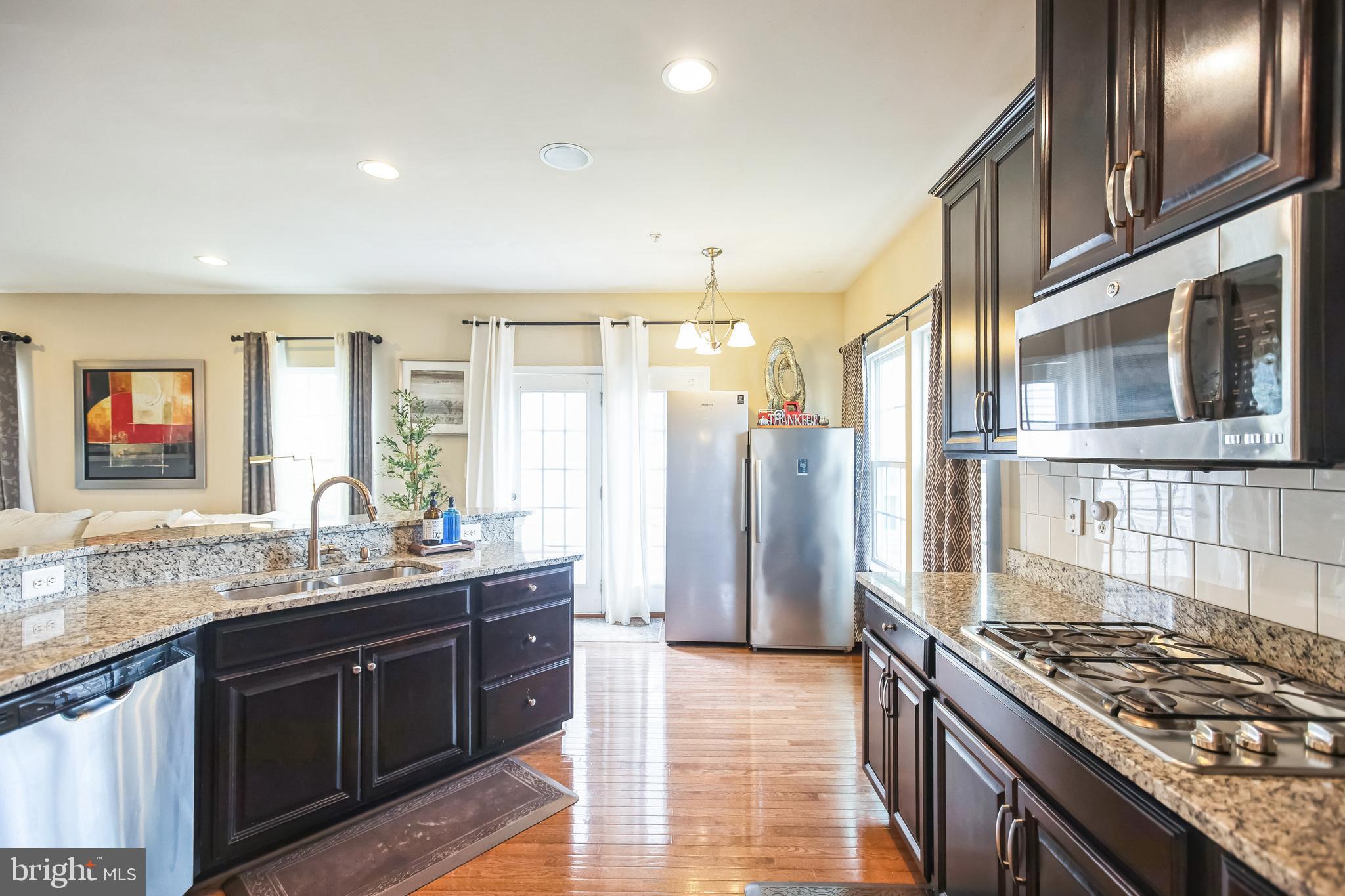 2601 St Marys View Road Accokeek, MD 20607 - Photo 2 of 33 a kitchen with stainless steel appliances granite countertop a stove and a sink