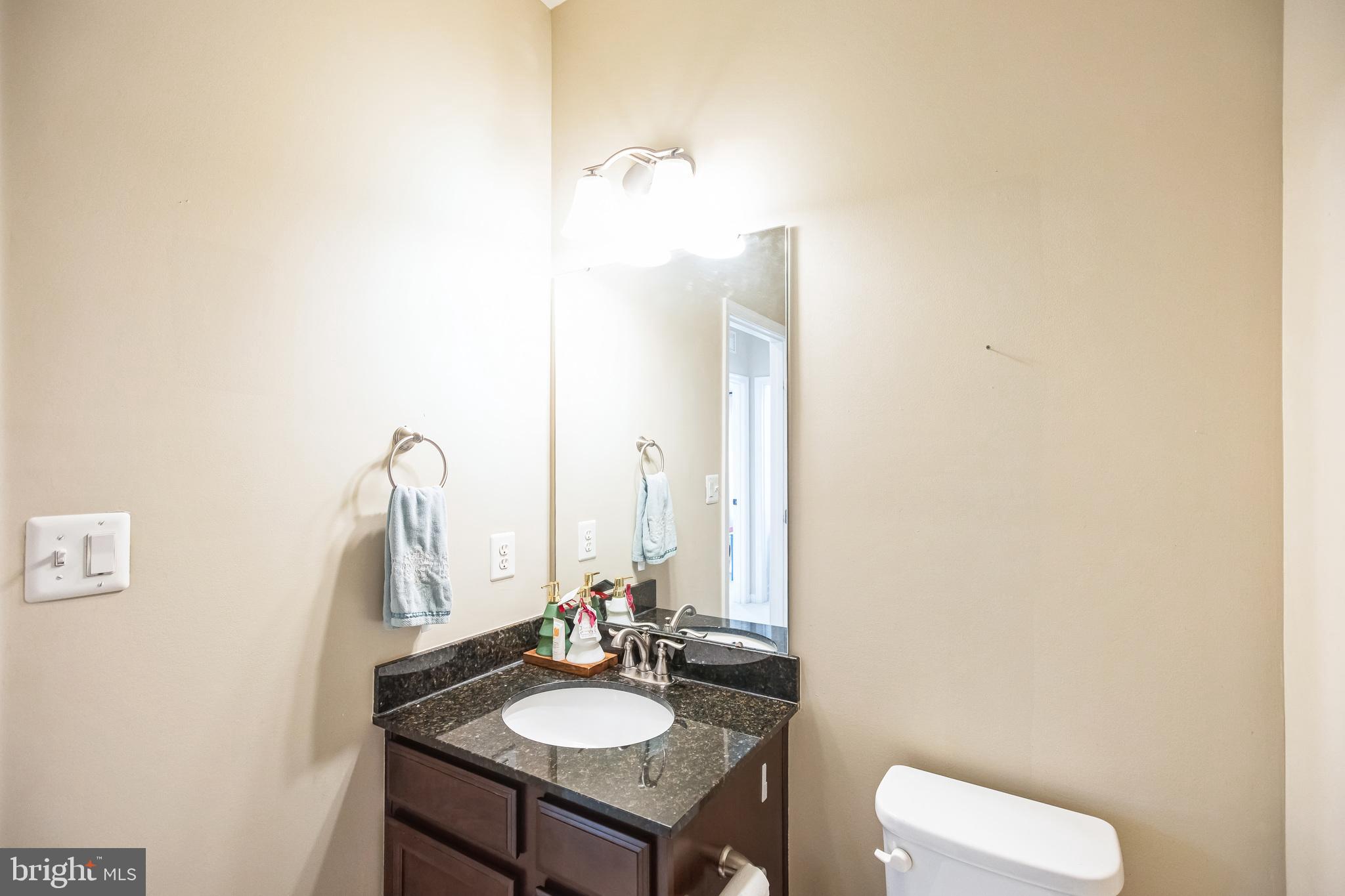 2601 St Marys View Road Accokeek, MD 20607 - Photo 25 of 33 a bathroom with a sink and a mirror