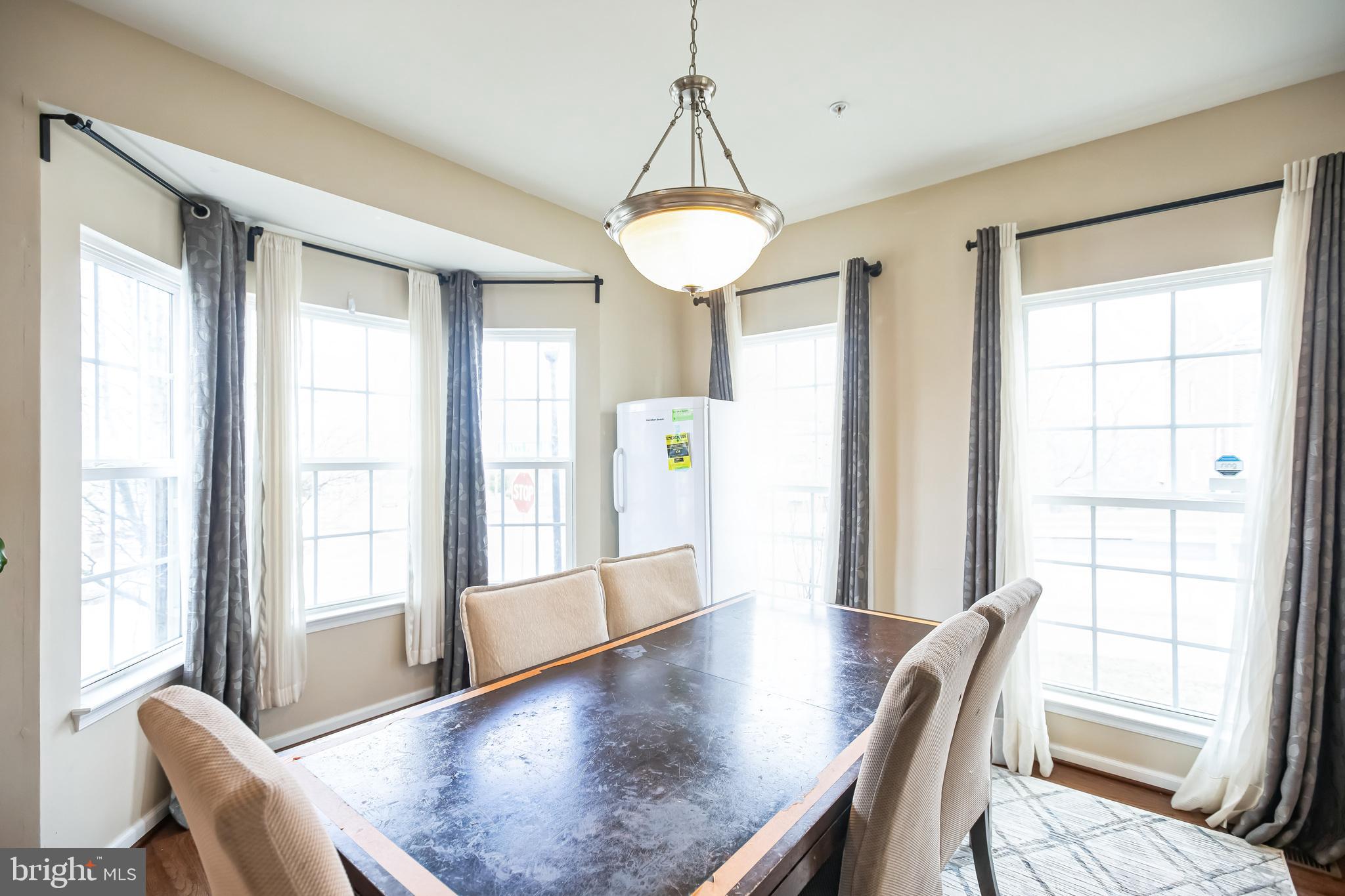 2601 St Marys View Road Accokeek, MD 20607 - Photo 8 of 33 a view of a dining room with furniture window and wooden floor