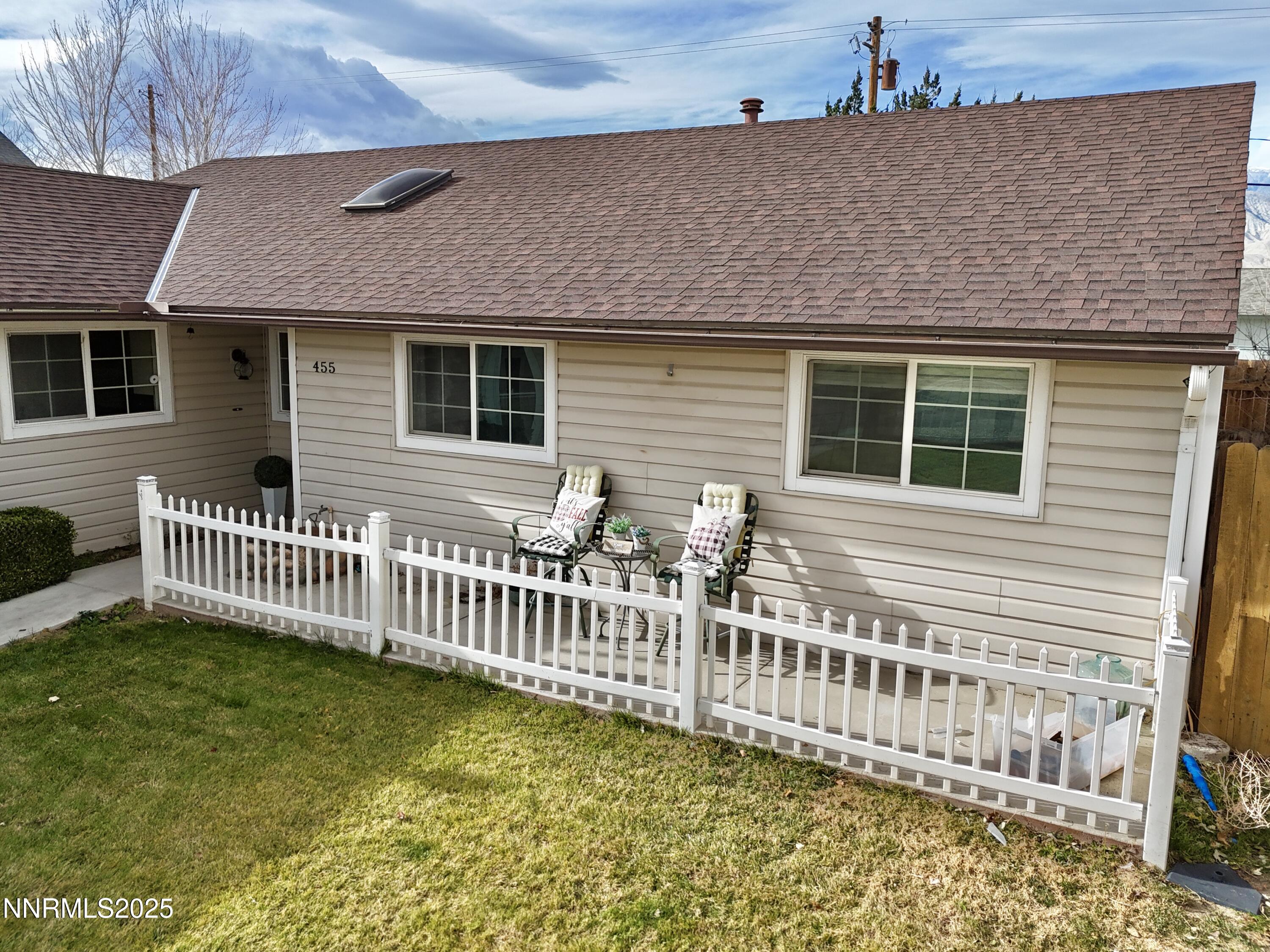 455 Connely Street Hawthorne, NV 89415 - Photo 6 of 43 a front view of a house with a garden