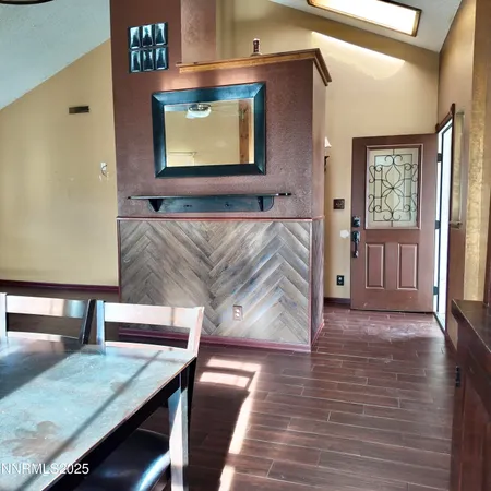 a kitchen with a sink a stove a refrigerator and cabinets