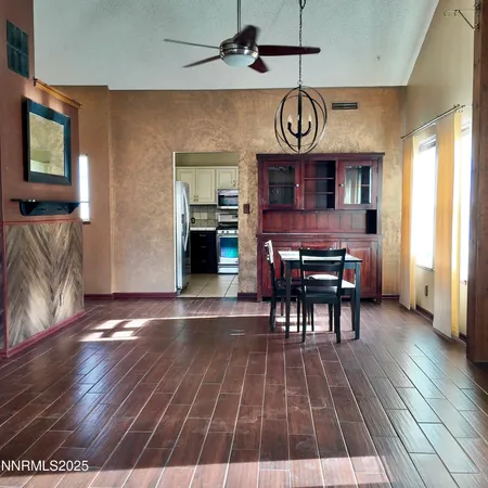 a kitchen with a sink and a refrigerator
