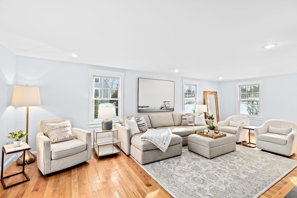 54 Dreamwold Road Scituate, MA 02066 - Photo 11 of 41 a living room with furniture and a couch