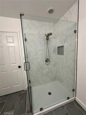 a view of a ocean with beach and outdoor space