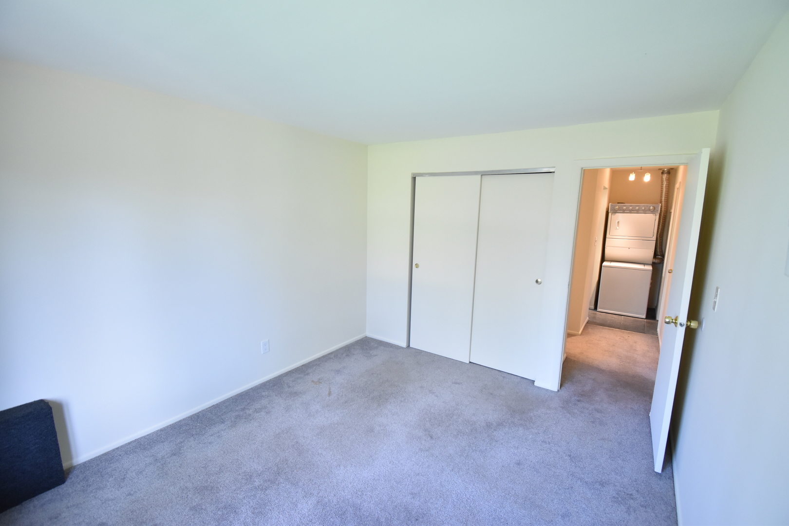 4618 Northfox Lane, Unit 6 McHenry, IL 60050 - Photo 9 of 15 an empty room with closet area