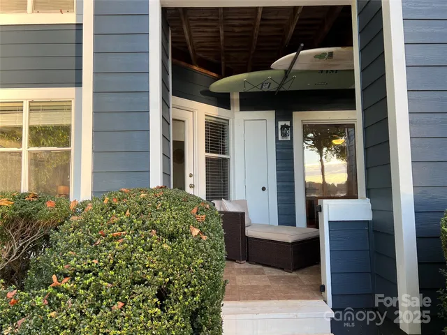 a front view of a house with glass windows