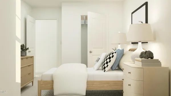 a bedroom with furniture and a mirror