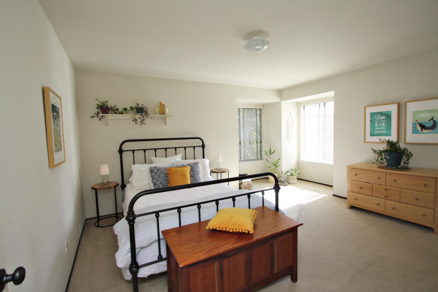 111 Bean Creek Road, Unit 26 Scotts Valley, CA 95066 - Photo 17 of 28 a bedroom with furniture and a window