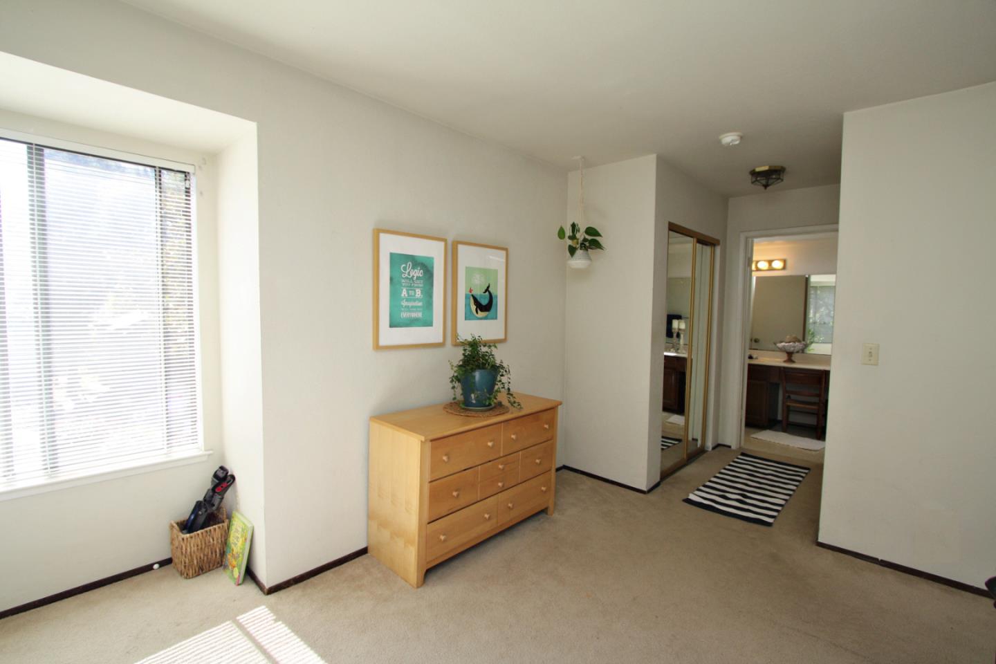 111 Bean Creek Road, Unit 26 Scotts Valley, CA 95066 - Photo 18 of 28 a living room with furniture and a window