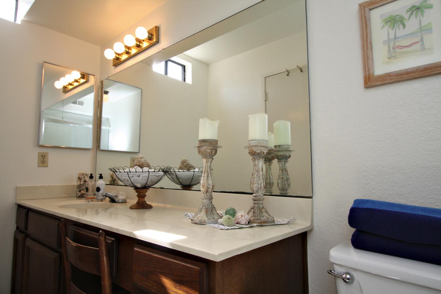 111 Bean Creek Road, Unit 26 Scotts Valley, CA 95066 - Photo 21 of 28 a bathroom with a sink and a mirror